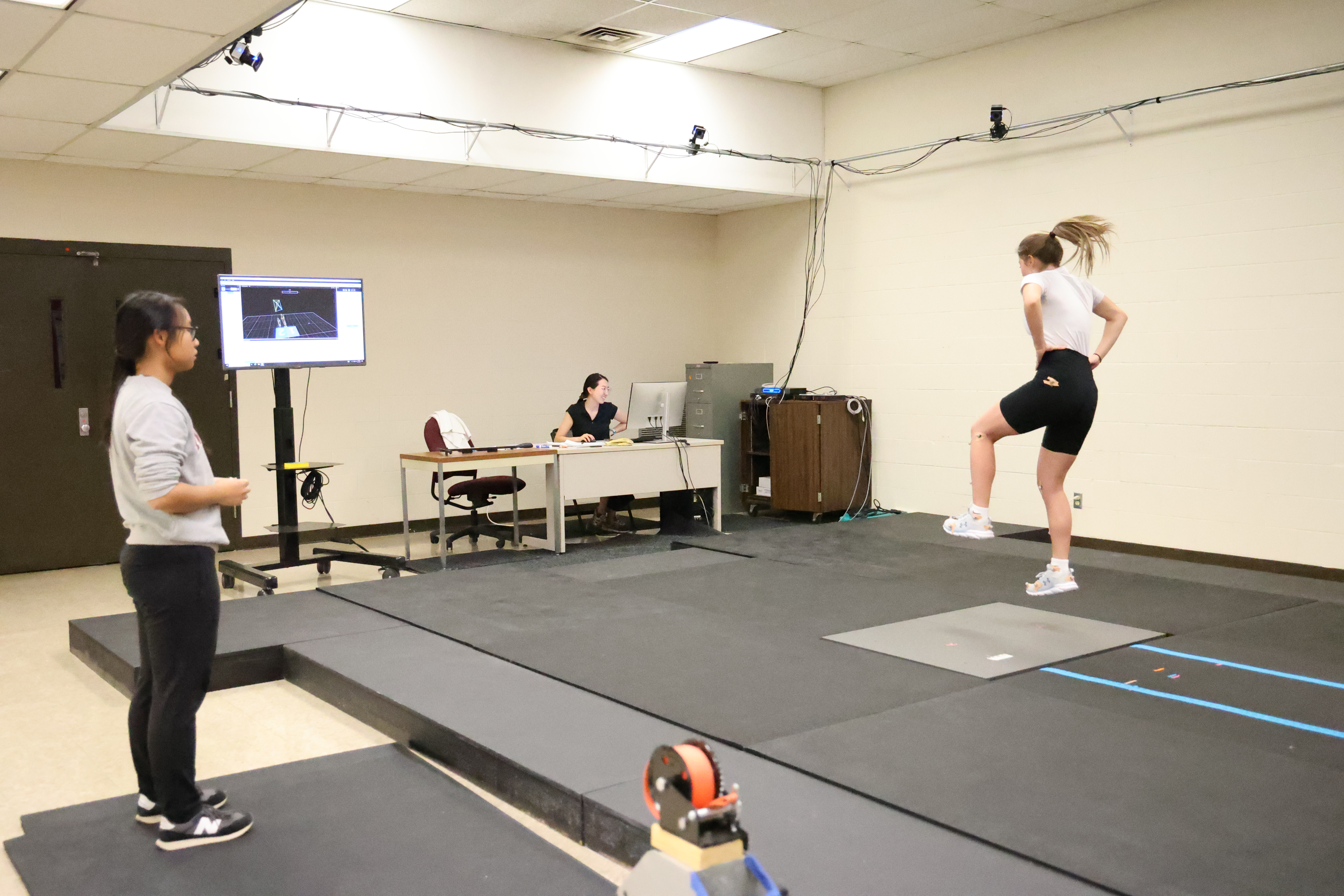 A young athlete performs before motion capture technology. 